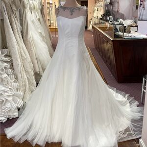 Elegant White Wedding Gown with Beaded Neckline